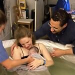 Lucy and husband Jon with their brand newborn baby, born at home in a pool in Banbury